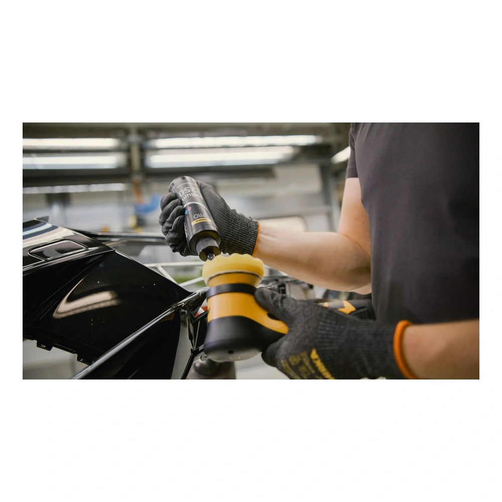 Person applies polish to car with tool