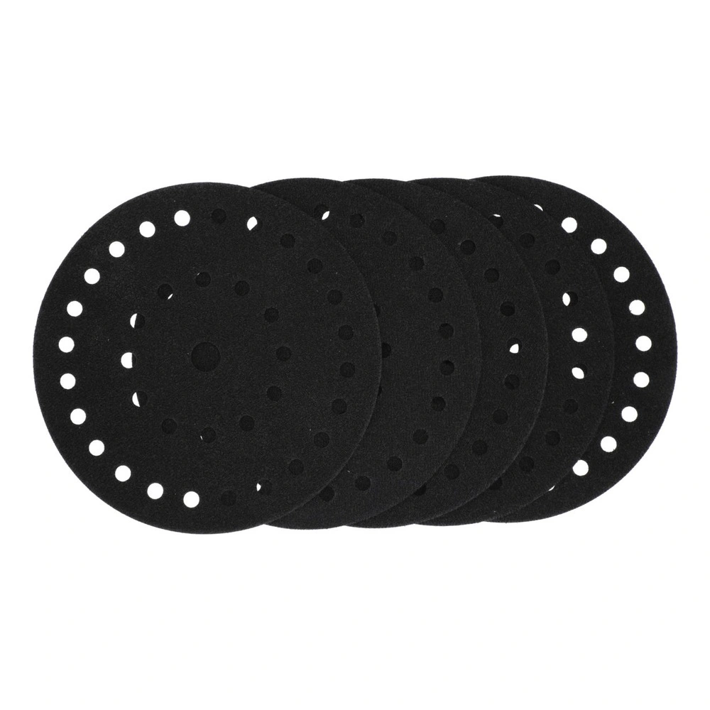 Five overlapping black perforated circular pads