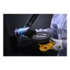 Person applying compound to a polishing pad