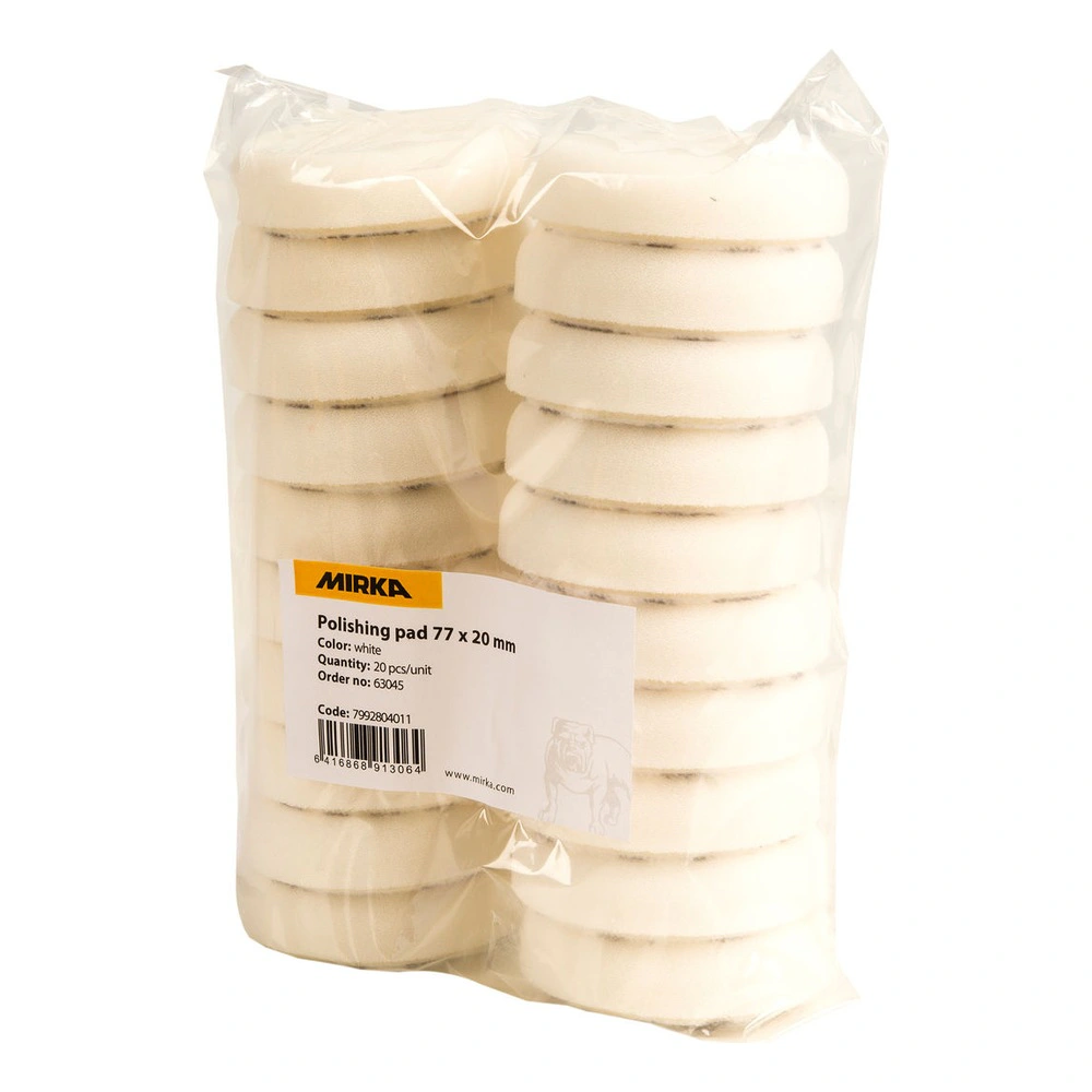 Clear bag with stacked white polishing pads
