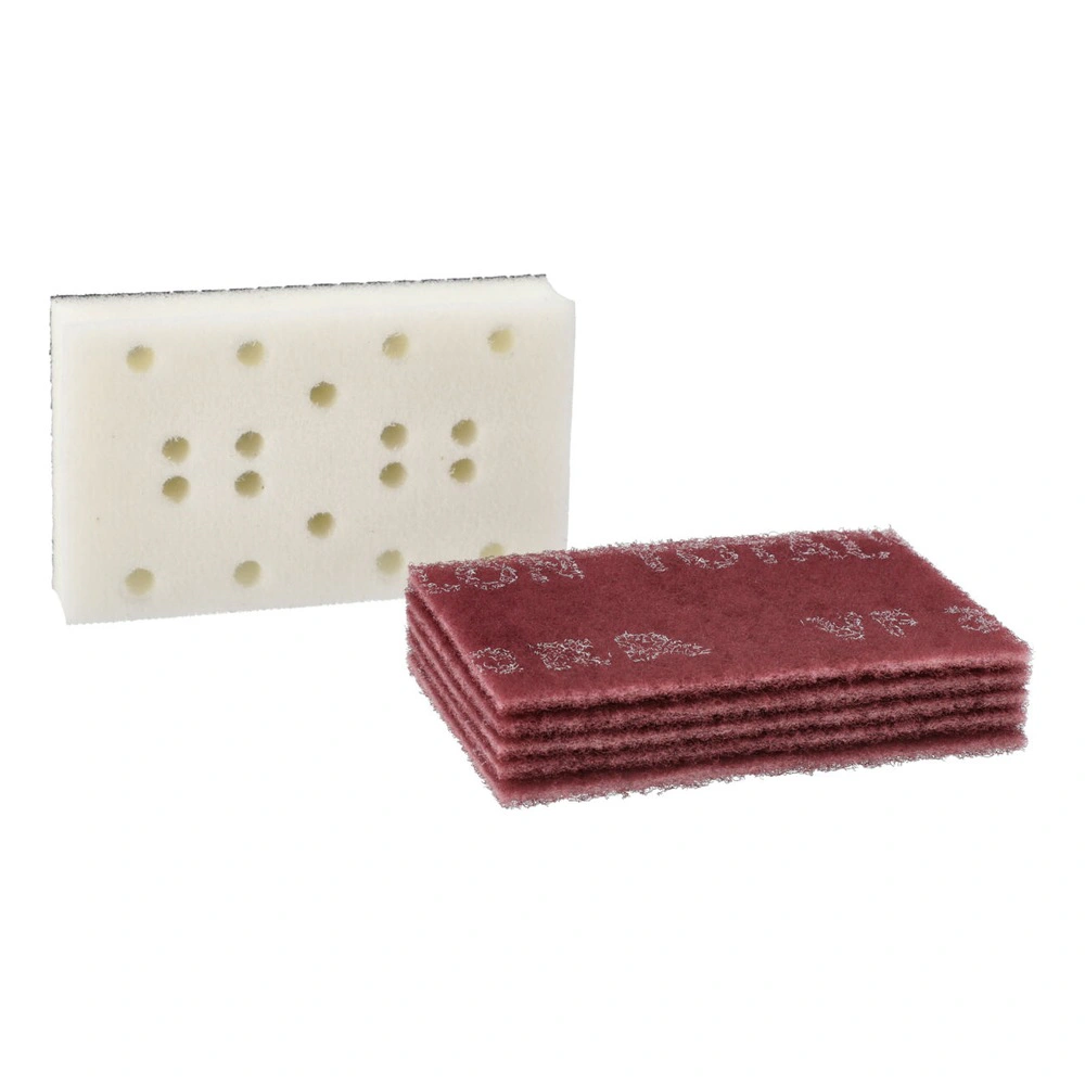 Perforated white pad beside maroon stack