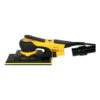 Hand sander attached to black hose