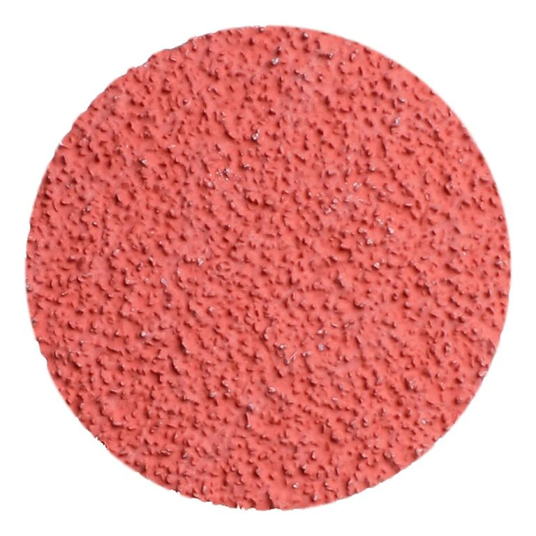 Red round abrasive disc, front view