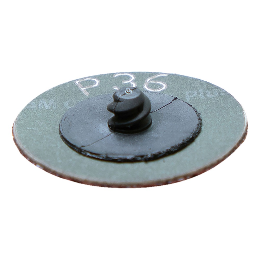דיסק ירוק עם מתאם שחור במבט אלכסוני - Green disc with black adapter, angled view