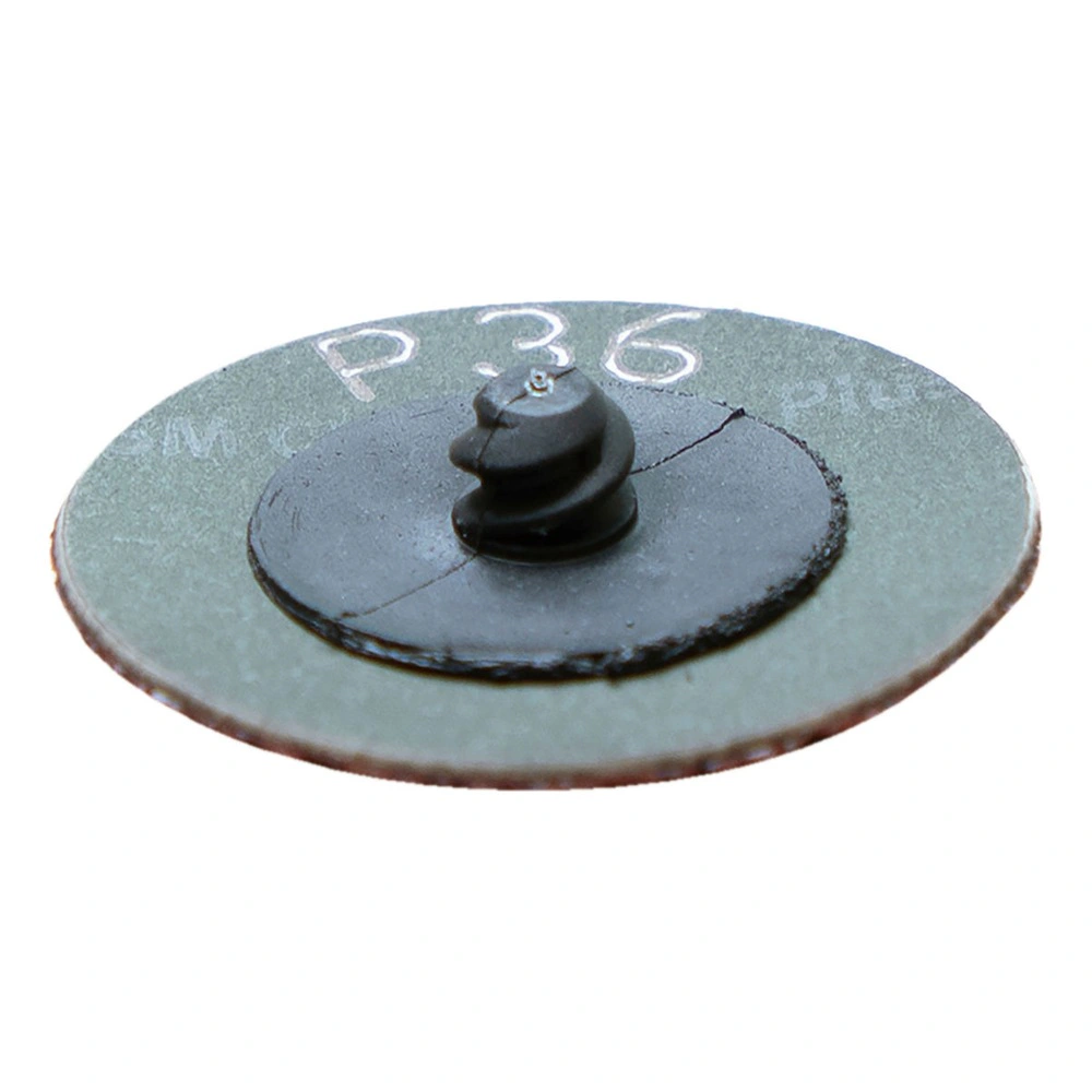 דיסק ירוק עם מתאם שחור במבט אלכסוני - Green disc with black adapter, angled view