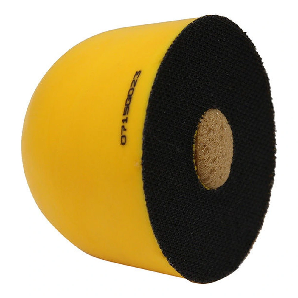 Yellow and black cylindrical block with central hole