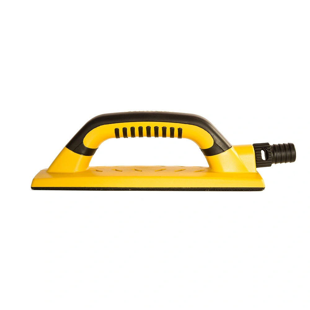 Yellow and black sanding block in side view