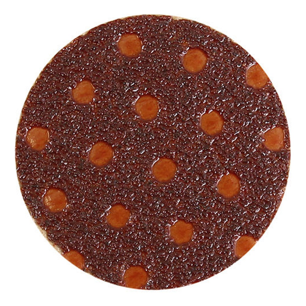 Close-up of brown dotted circular sanding disc