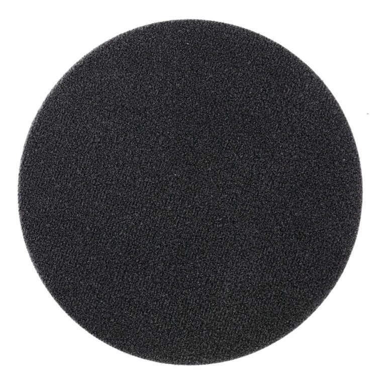 Black round disc, shown frontally on white