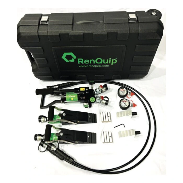 Open case with two tools, pump and hoses