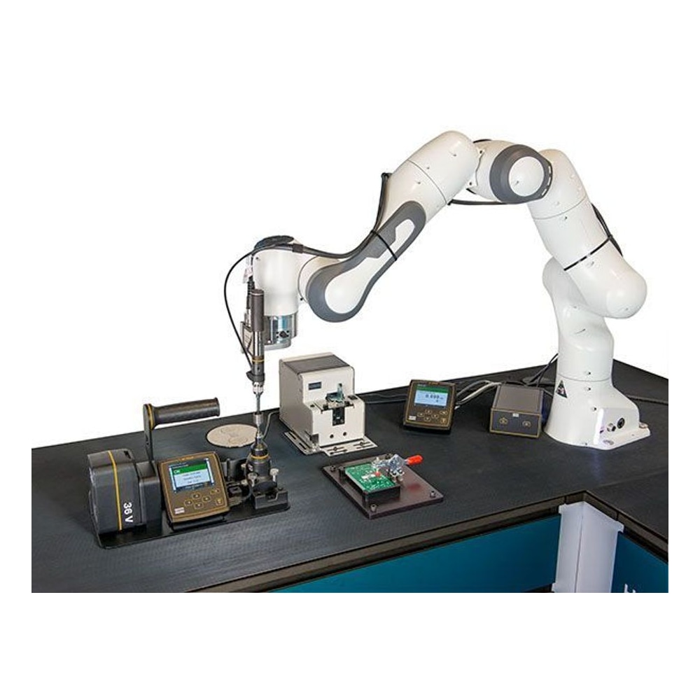 Robotic arm mounts a screwdriver on a workbench